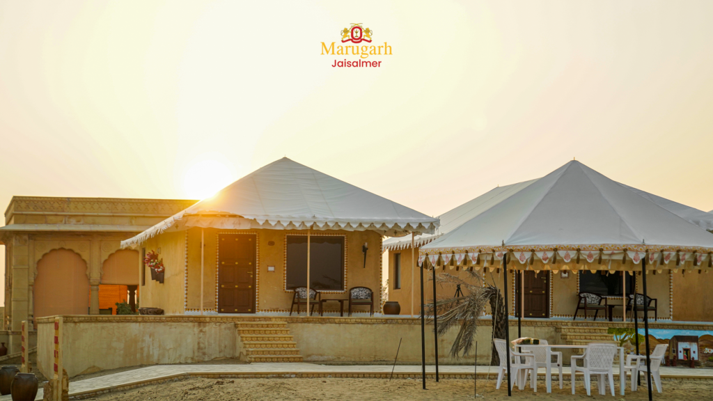 Cottage tents at Marugarh Jaisalmer glowing in the golden sunset light